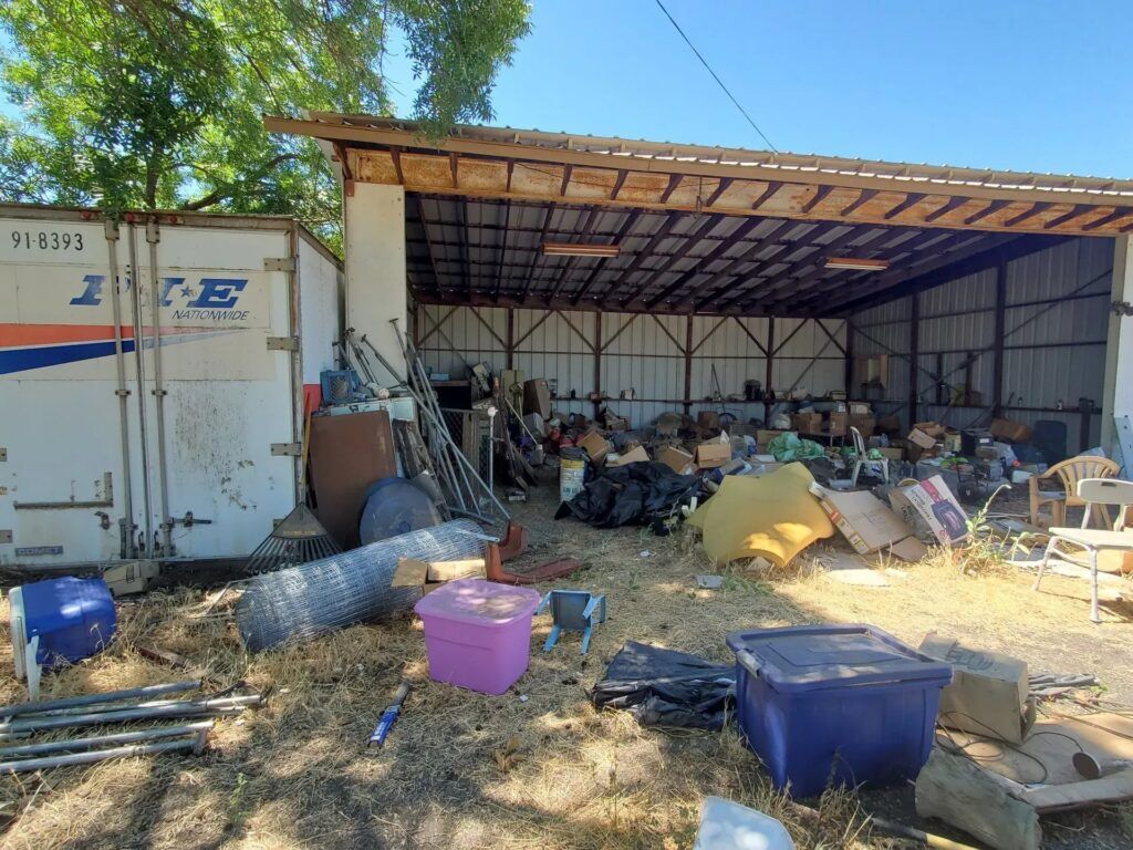 Storage shed filled with clutter
